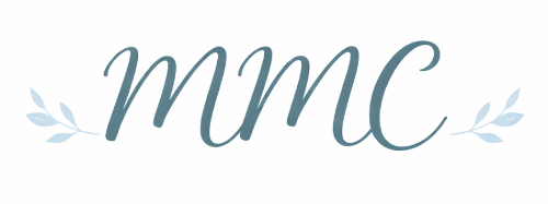 Text 'mmc' with decorative leaves on each side, in a cursive font, on a white background.