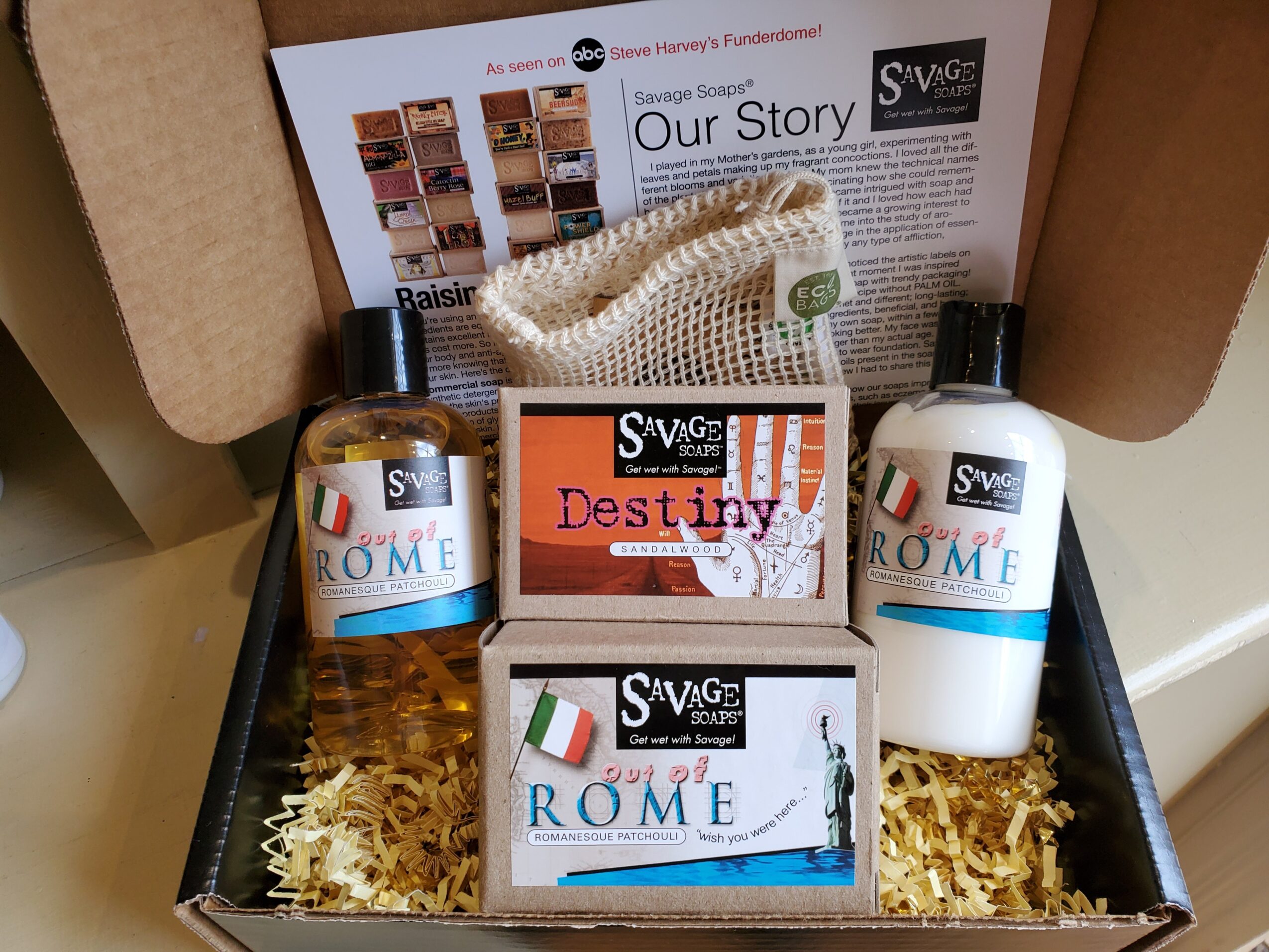 Open box with two bottles of skincare products, a small box labeled 'Destiny,' and a brochure inside.