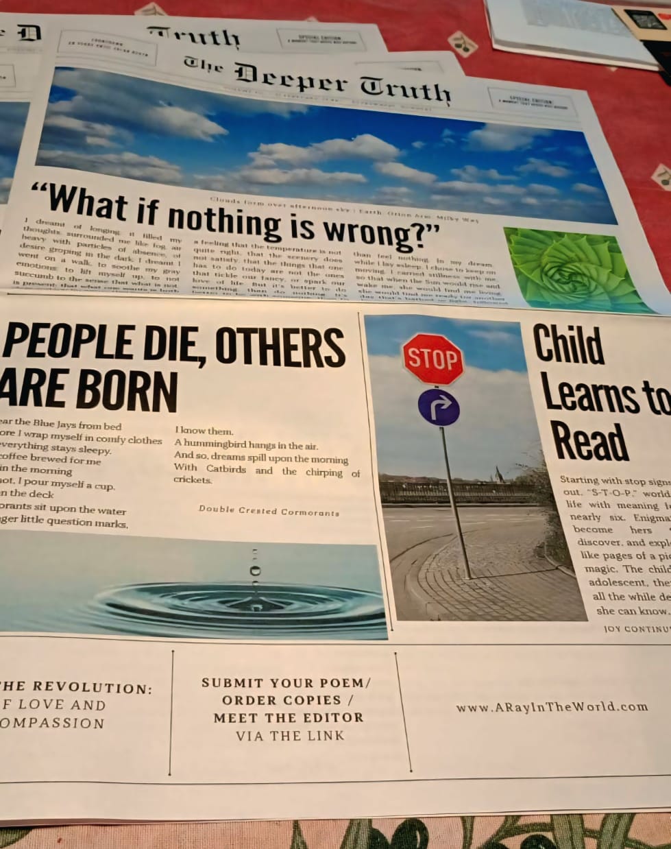 Multiple newspapers on a table, with headlines including 'What if nothing is wrong?' and 'People die, others are born.'