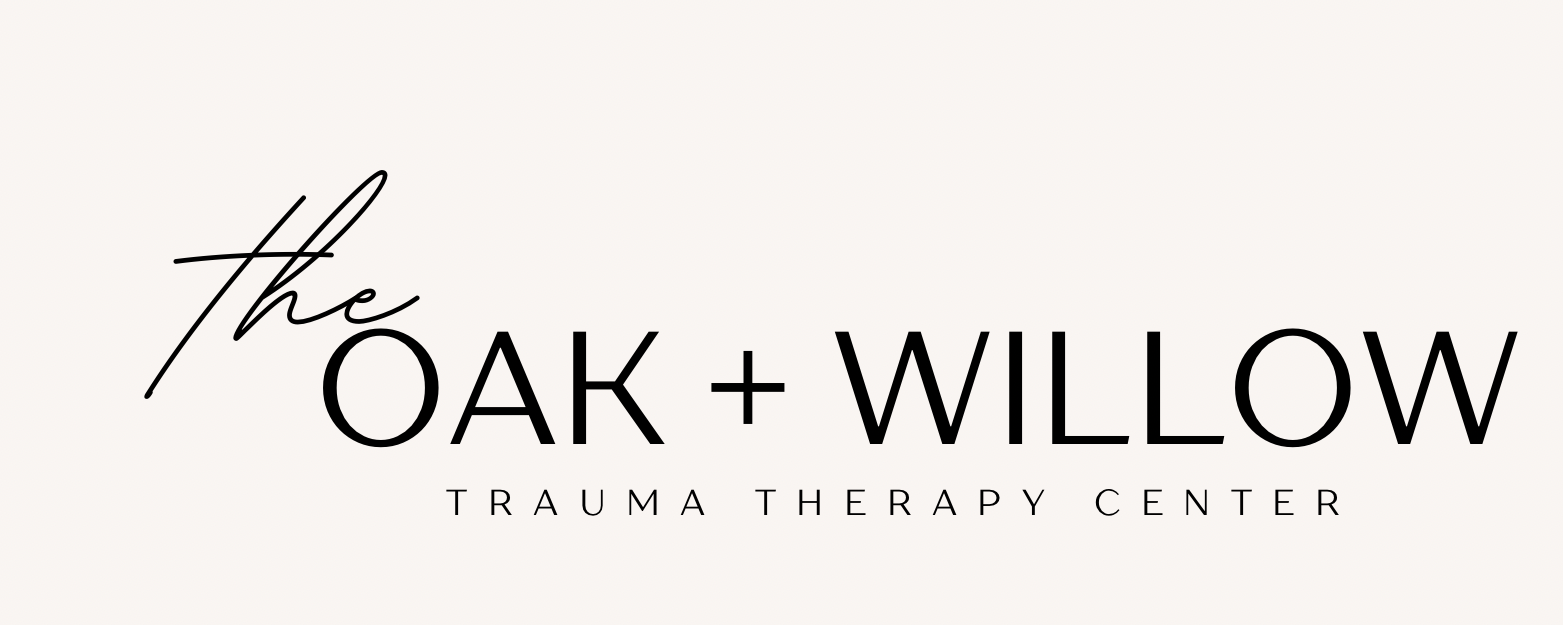Logo with text 'the OAK + WILLOW TRAUMA THERAPY CENTER' in black on white background.