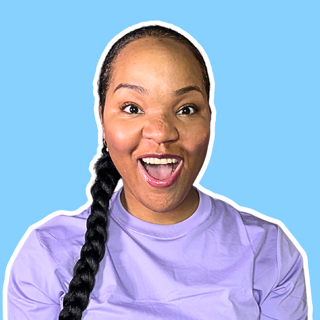 A woman with a long braid, smiling with open mouth, wearing a purple shirt, against a blue background.