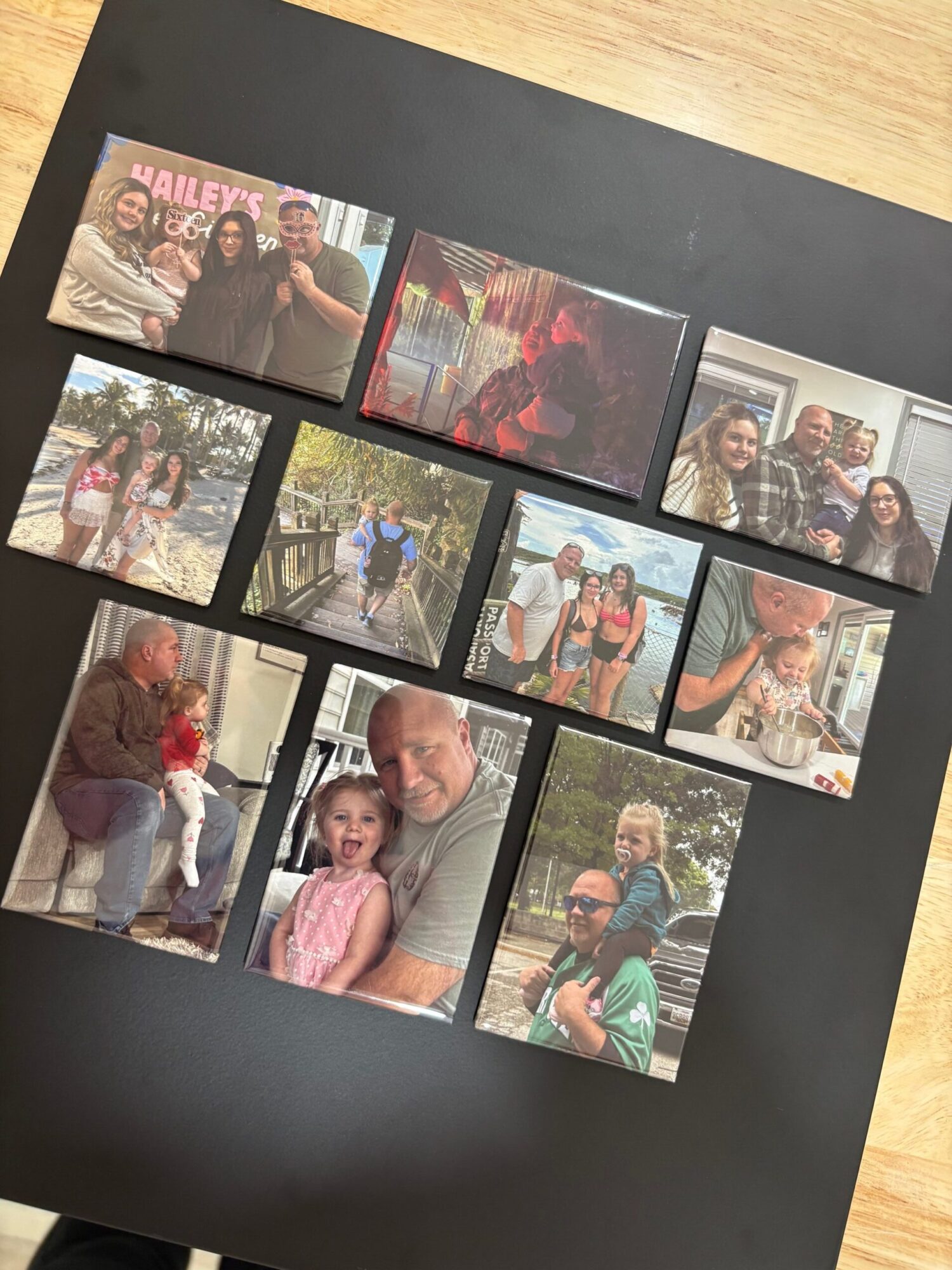 Collection of ten photos on a black surface showing people, children, and outdoor scenes.