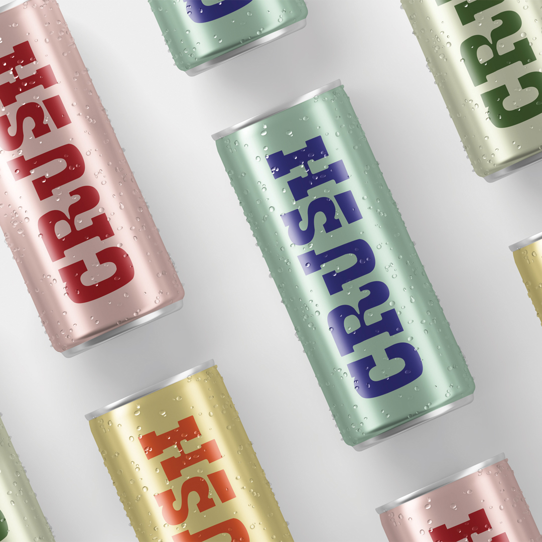 Multiple cans of Crush soda in various colors arranged diagonally, with visible brand logos and condensation on cans.