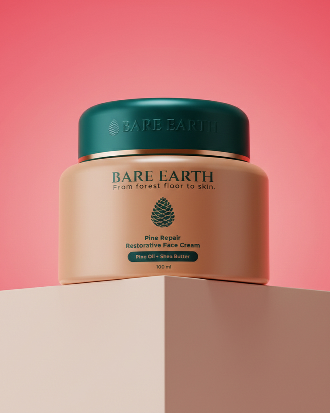 A jar of Bare Earth face cream with a green lid and beige body, placed on a white surface against a pink background.