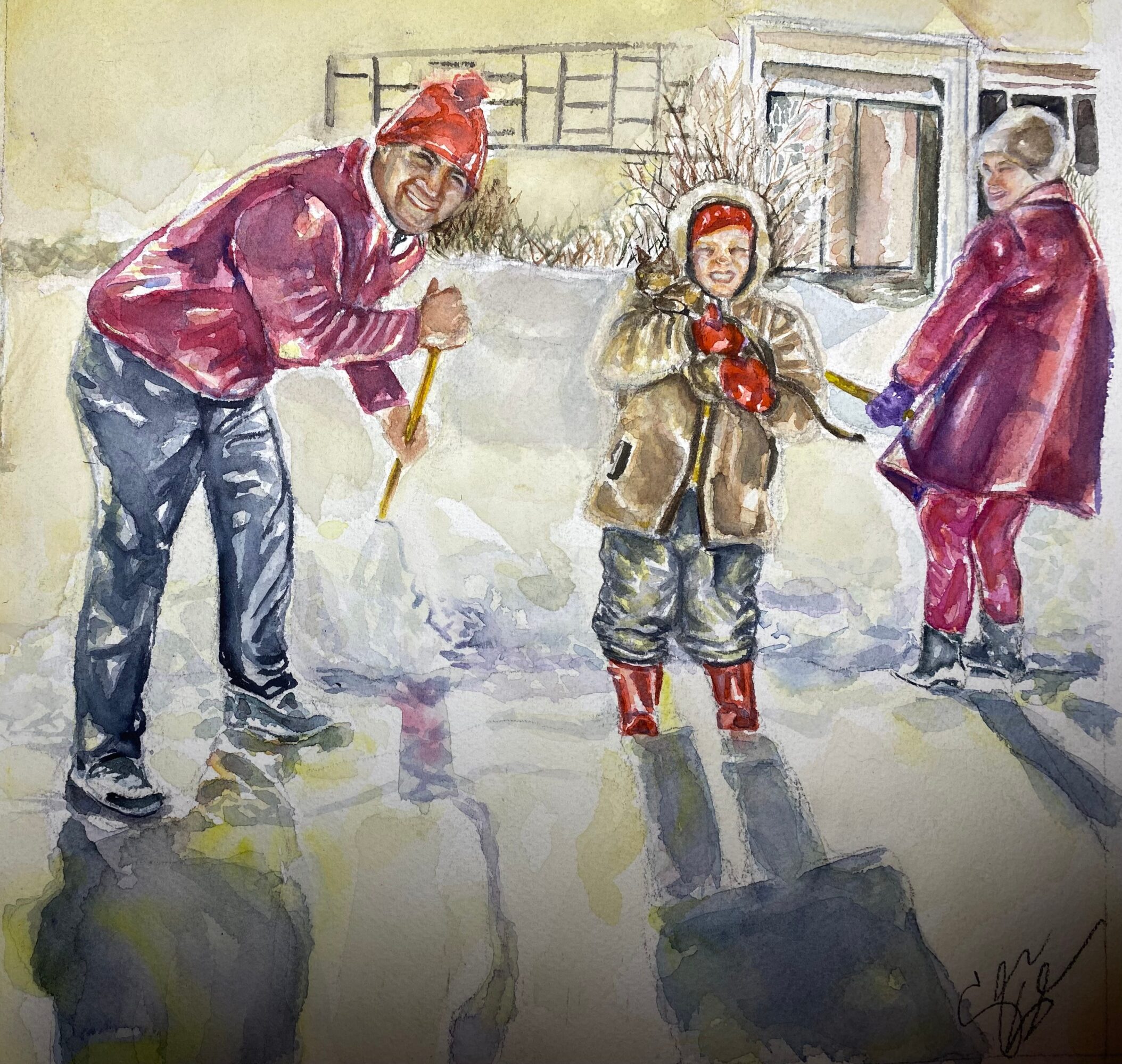 Three people, two adults and a child, are shoveling snow outside a house, with snow and a fence in the background.