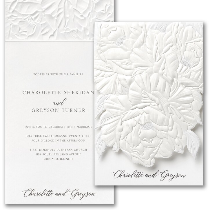 Wedding invitation with floral embossed design, names Charlette and Grayson, and event details in elegant font.