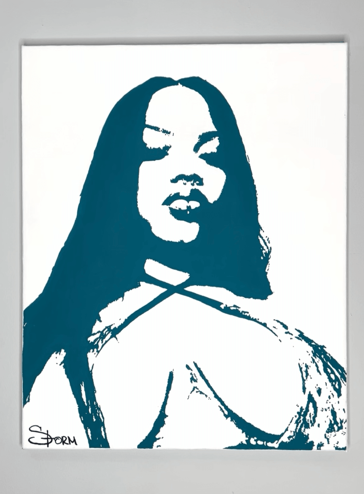 Stylized portrait of a woman with long hair, lips slightly parted, and a confident expression, in blue and white.