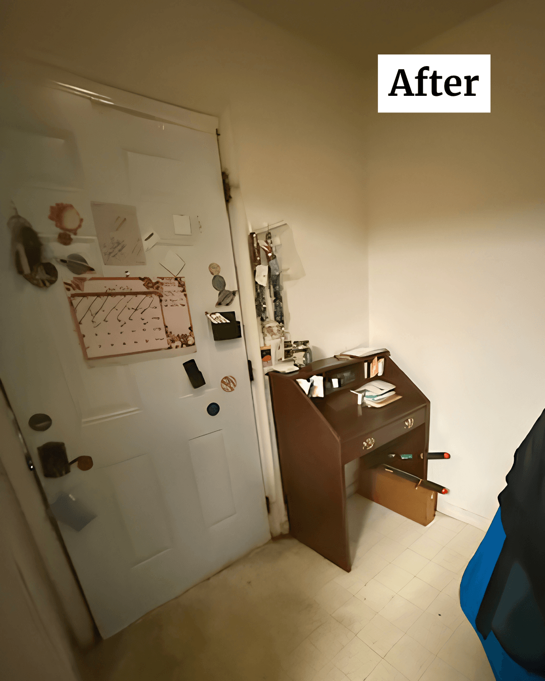Door with various items attached, small brown cabinet with items on top, and a partially visible person on the right.