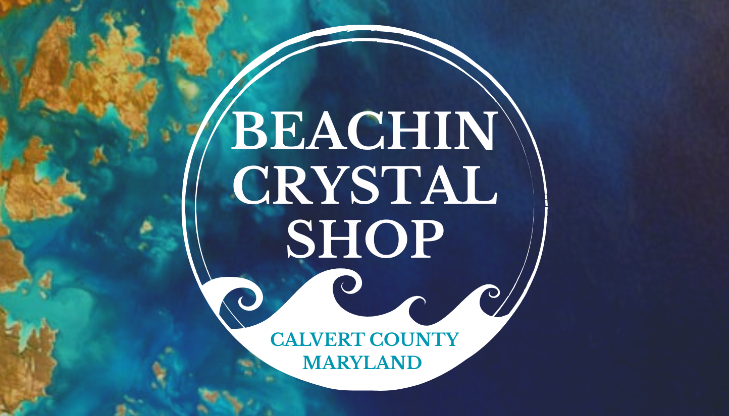 Logo for Beachin Crystal Shop with text and decorative waves, background of blue and gold colors.