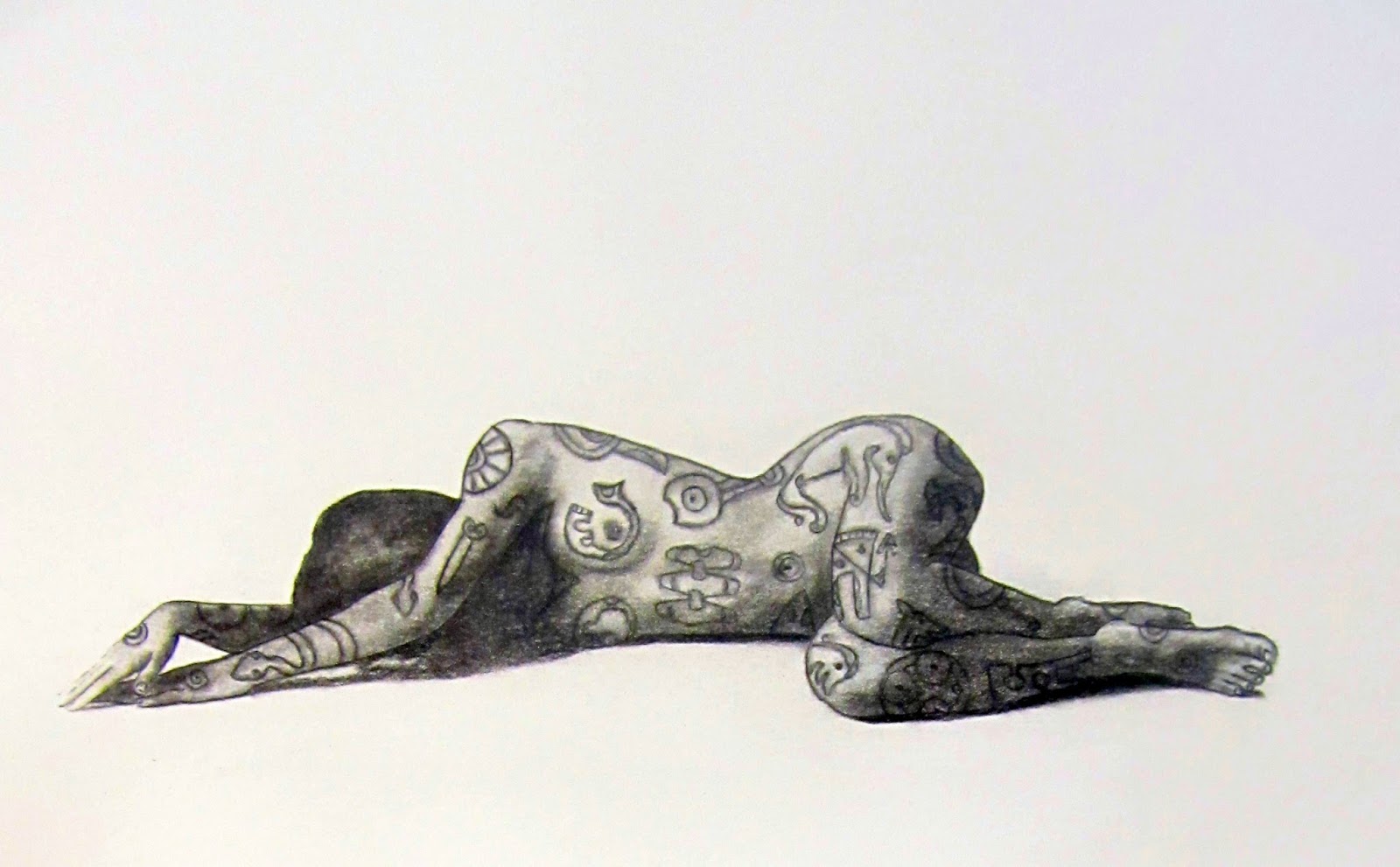 A black and white drawing of a person lying on their side with tattoos visible on their body.