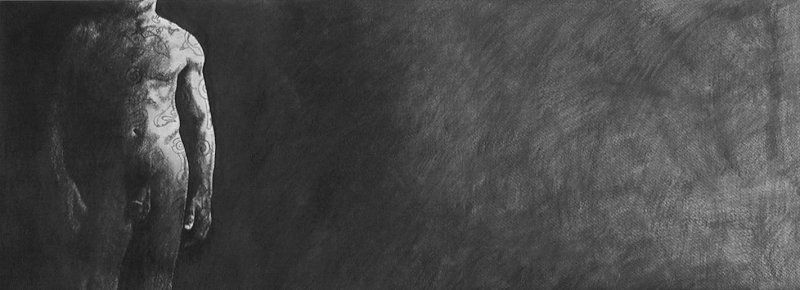 Partial view of a person's torso and arm on the left side, with a textured gray background.